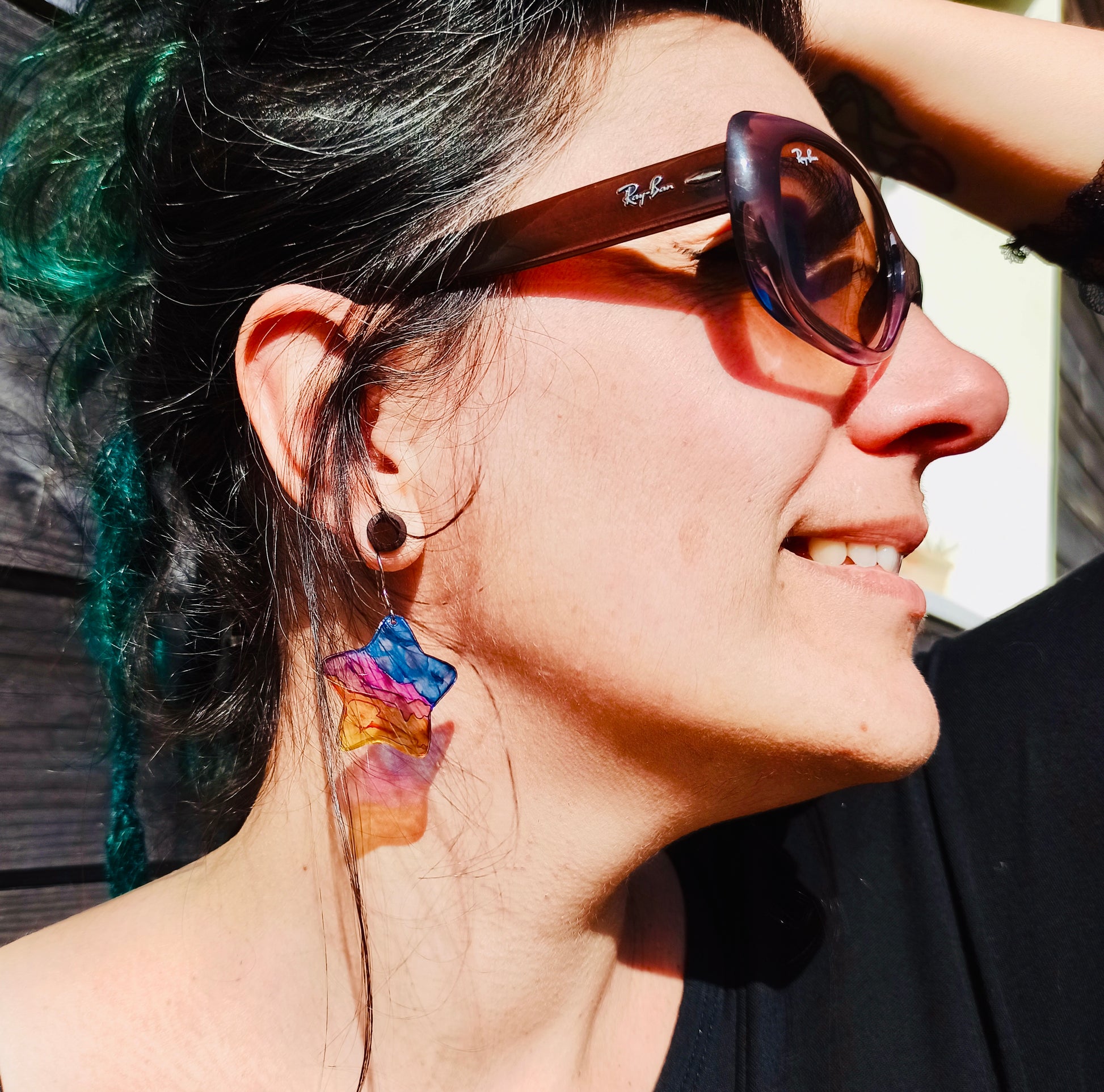 boucles d’oreilles ecoresponsables en forme d’étoile, inspirees d’un coucher de soleil à la plage