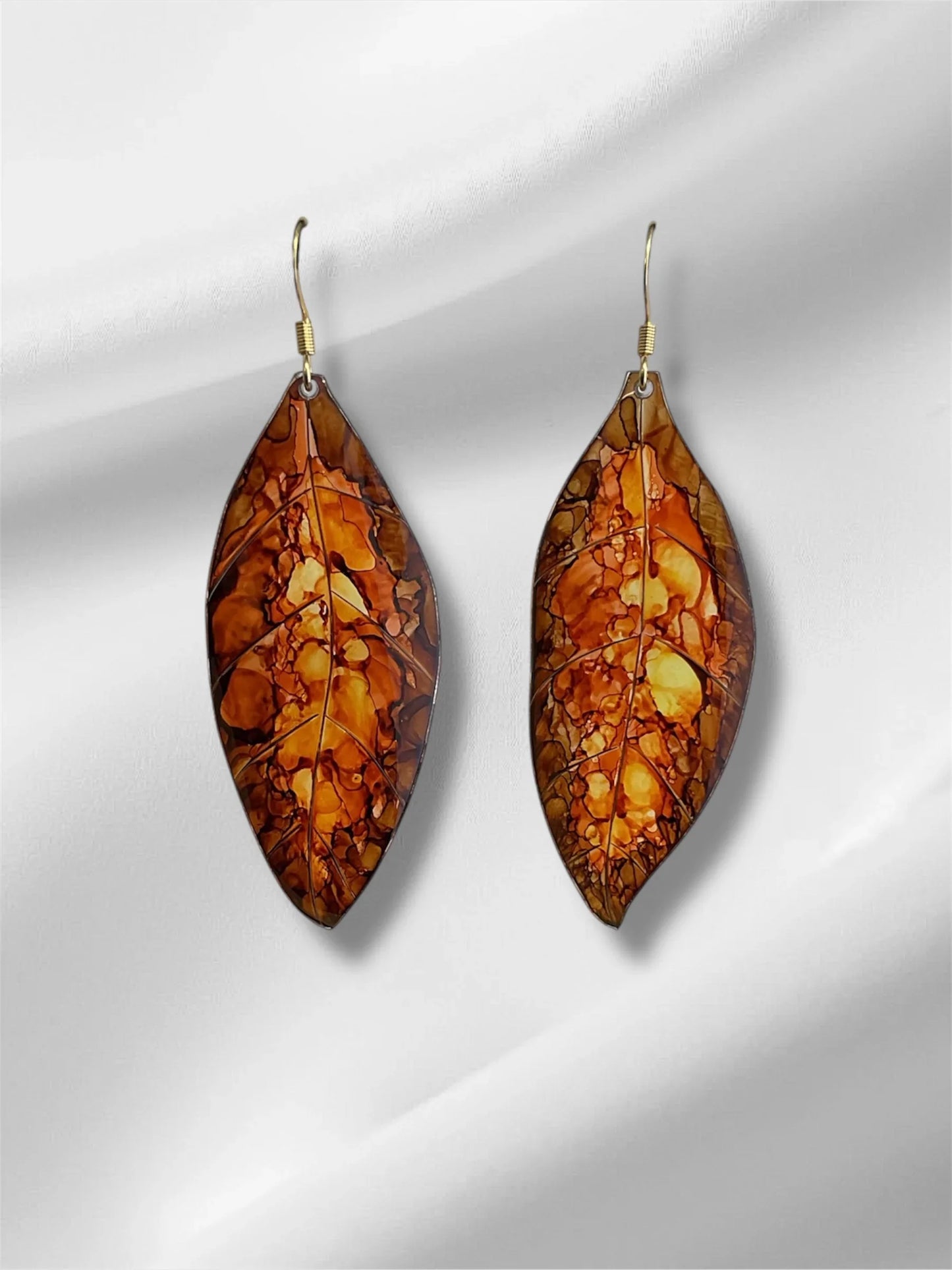 boucle en plastique recyclé, imitant une feuille d’automne