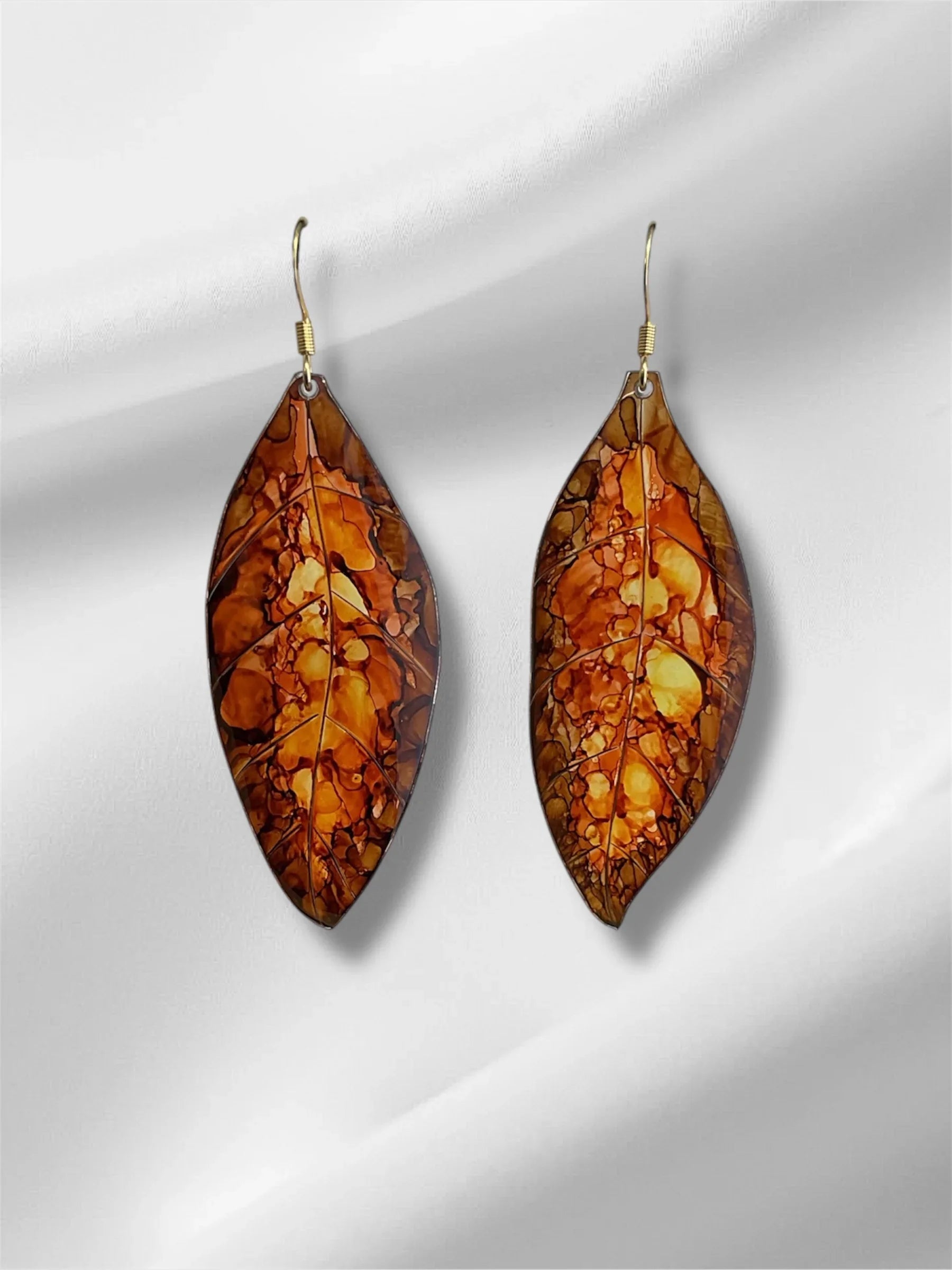 boucle en plastique recyclé, imitant une feuille d’automne