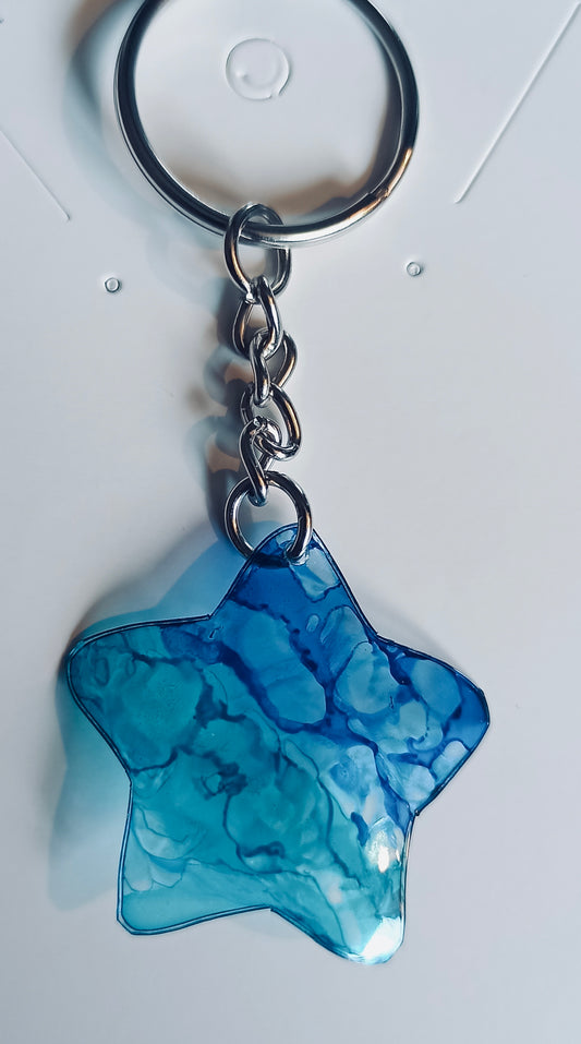 porte clef en plastiquenrevalorisé, forme étoile, bleu turquoise